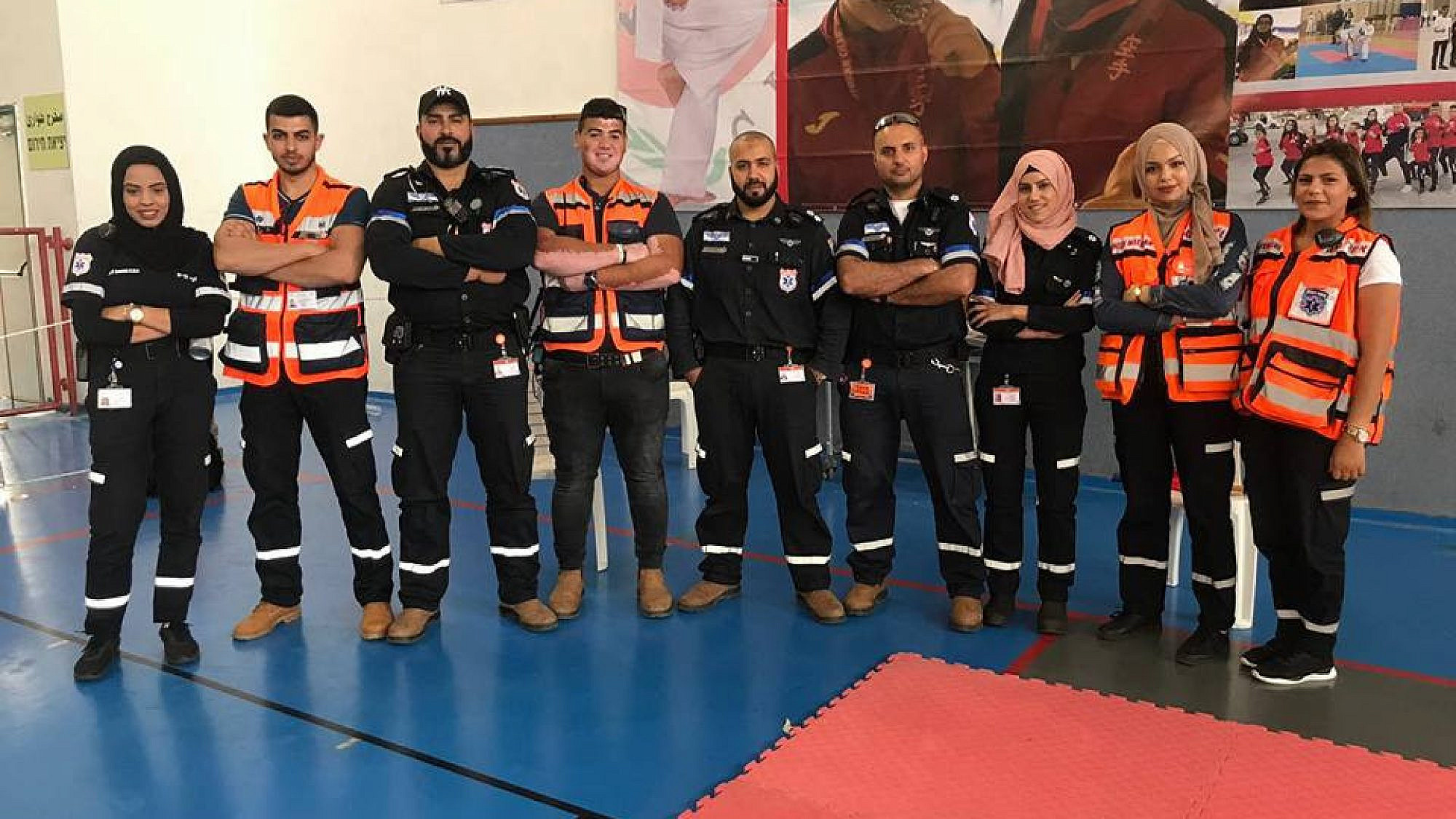 Muslim volunteers of United Hatzalah and the local ambulance team of Kfar Kara pose together after a training session. Sanaa Mahameed is third from right. Credit: United Hatzalah.