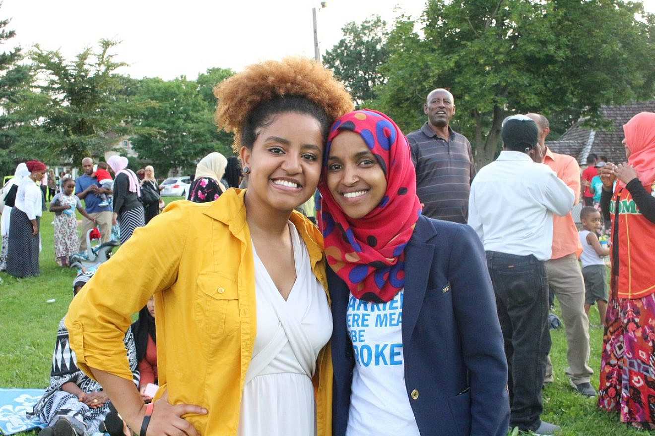 Democratic Party candidate for Congress Ilhan Omar (right), a Somali American who represents Minnesota, appears alongside a supporter at a Fourth of July barbecue. Source: Ilhan Omar via Twitter.