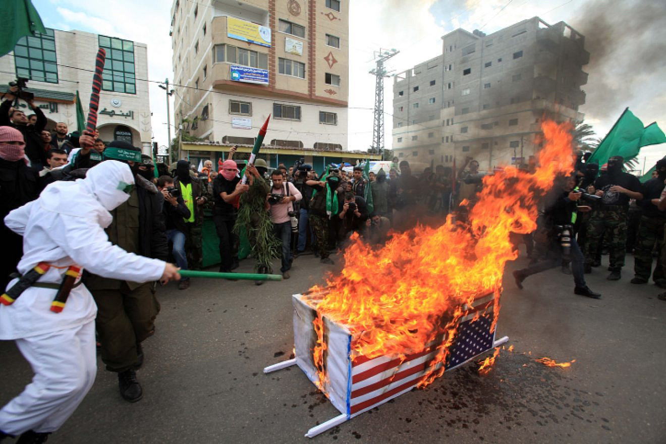 Palestinian Hamas militants set fire to a coffin wrapped with U.S. flag during an anti-Israeli rally in al-Nuseirat refugee camp in the center of the Gaza Strip on Dec. 11, 2009. Photo by Wissam Nassar/Flash90.