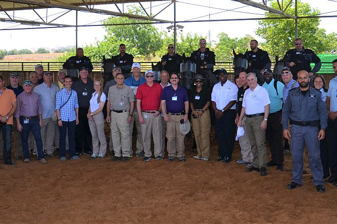 The delegation of 21 senior law-enforcement officials from Georgia, Alabama and Tennessee with the Tel Aviv Mounted Police. Credit: Georgia International Law Enforcement Exchange (GILEE).