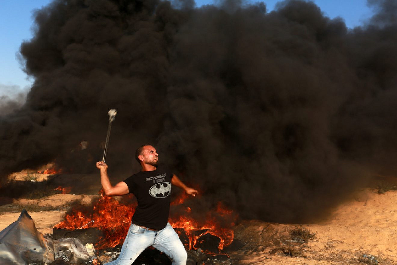 File photo: Palestinian protesters launch incendiary devices on the Gaza border with Israel on July 20, 2018. Photo by Abed Rahim Khatib/Flash90.