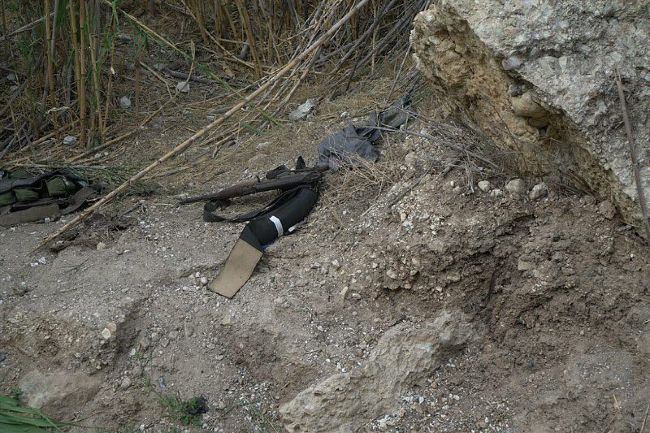 A photo of what appears to be an AK-47 assault rifle and explosives found with seven Islamic State terrorists who entered Israel. Credit: IDF Spokesperson Unit.