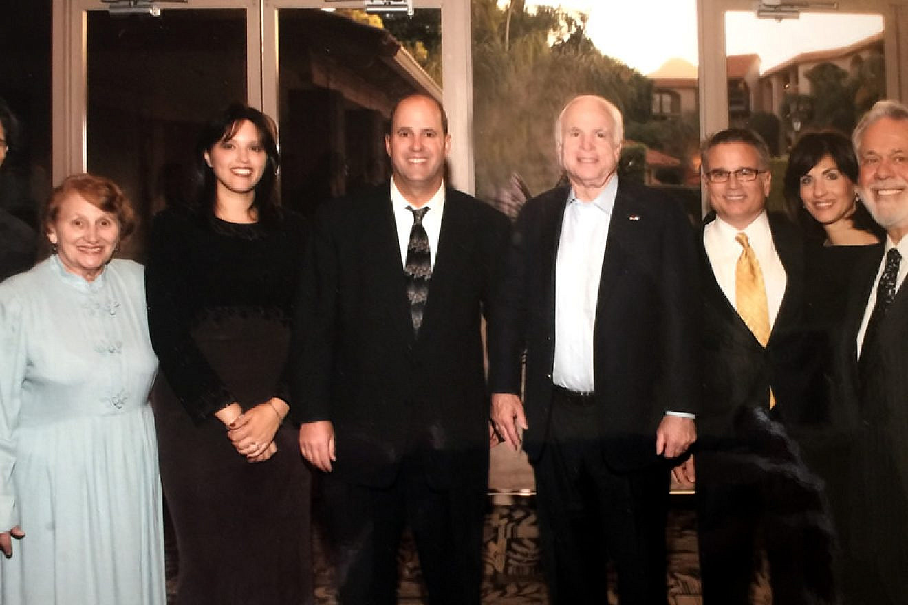 Farley Weiss (fourth from left) and family members, including his mother, Judge Irene Weiss (second from left), with U.S. Sen. John McCain (R-Ariz.) at a  synagogue dinner held by Young Israel of Phoenix. Credit: Courtesy.
