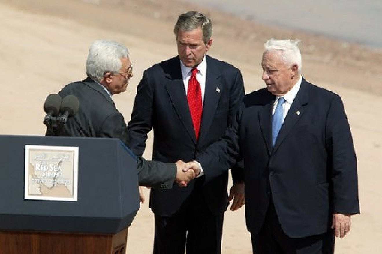 Palestinian leader Mahmoud Abbas, U.S. President George W. Bush and Israeli Prime Minister Ariel Sharon after reading a statement to the press during the closing moments of the Red Sea Summit in Aqaba, Jordan, on June 4, 2003. White House Photo by Paul Morse.