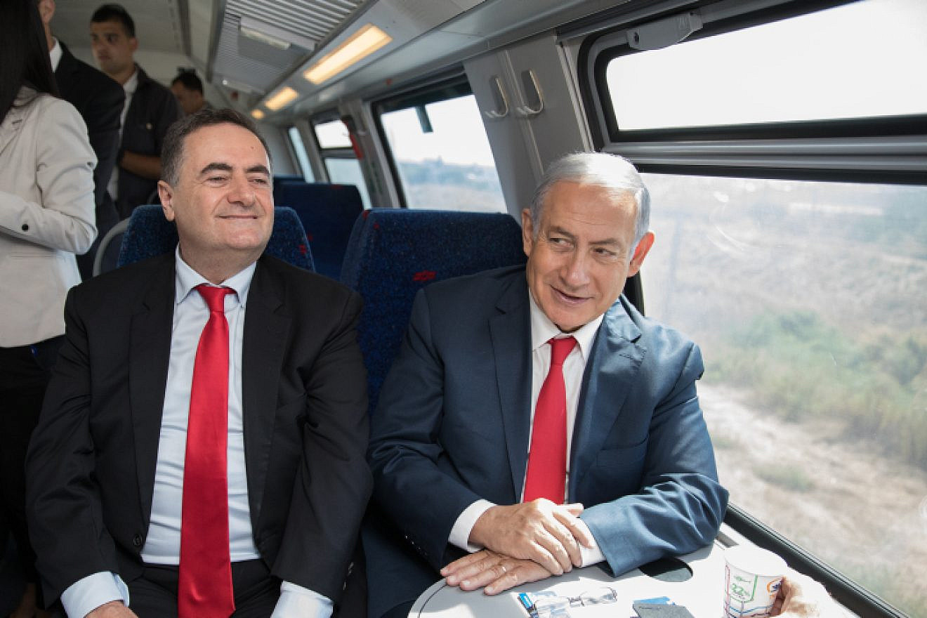 Minister of Transportation Israel Katz (left) and Israeli Prime Minister Benjamin Netanyahu  take a test drive of the Jerusalem-Tel Aviv express train in central Israel on Sept. 20, 2018. Photo by Noam Revkin Fenton/Flash90.