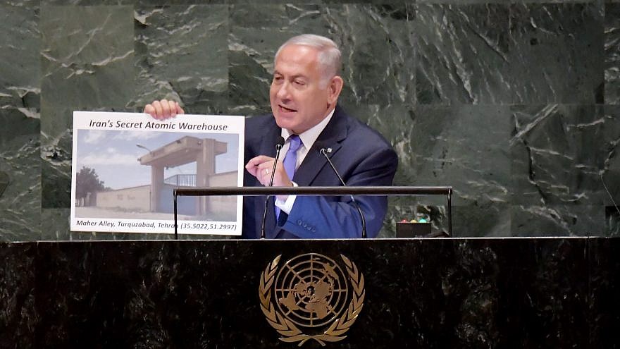 Israeli Prime Minister Benjamin Netanyahu addresses the U.N. General Assembly in New York, visual in hand, revealing a hidden Iranian nuclear facility and secret missiles in Lebanon’s capital, on Sept. 27, 2018. Photo by Avi Ohayon/GPO.