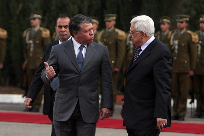 Palestinian Authority leader Mahmoud Abbas (right) and King Abdullah of Jordan during a welcoming ceremony in Ramallah on Nov. 21, 2011. Photo by Issam Rimawi/Flash90.