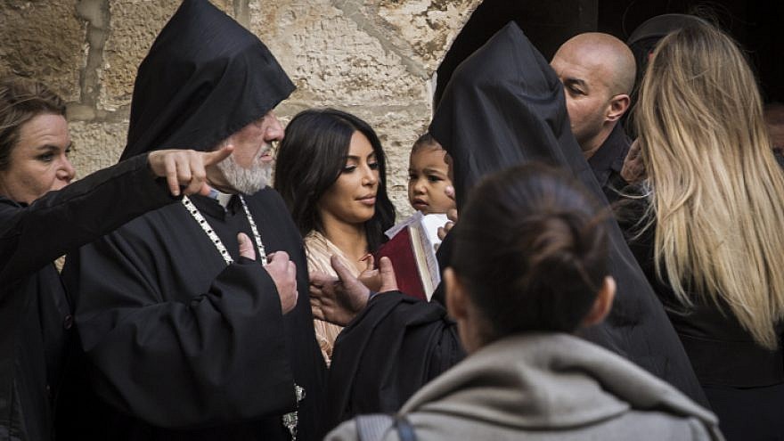 Kim Kardashian, her then-husband Kanye West and their daughter North are greeted by priests at the Saint James Armenian Church in the Armenian Quarter of Jerusalem's Old City, April 13, 2015. Credit: Hadas Parush/Flash90.