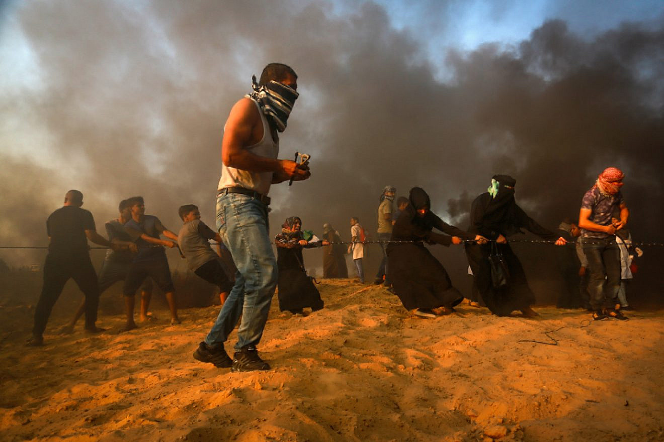 Palestinian protesters clash with Israeli security forces near the Gaza-Israel border on Sept. 28, 2018. Photo by Abed Rahim Khatib/Flash90.