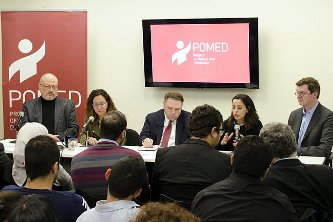 Journalist Jamal Khashoggi (left) at a 2018 project on Middle East Democracy at a forum called “Mohammed bin Salman's Saudi Arabia: A Deeper Look,” March 21, 2018. Credit: Wikimedia Commons.