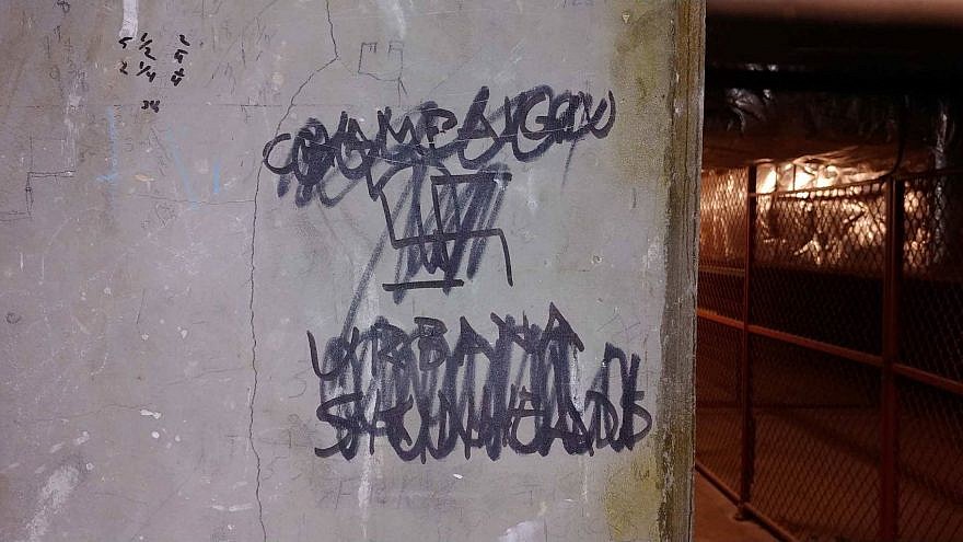 A swastika scrawled in a tunnel connecting chemistry buildings at the University of Illinois-Champaign was discovered between Nov. 16 and Nov. 19, 2018. Credit: Elan Karoll.