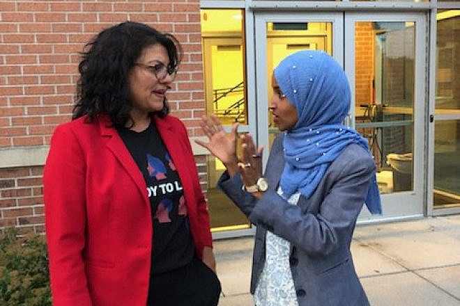 Then-Congresswoman-elect Rashida Tlaib (D-Mich.) and Ilhan Omar (D-Minn.) during their campaign in August 2018. Source: Rashida Tlaib via Twitter.