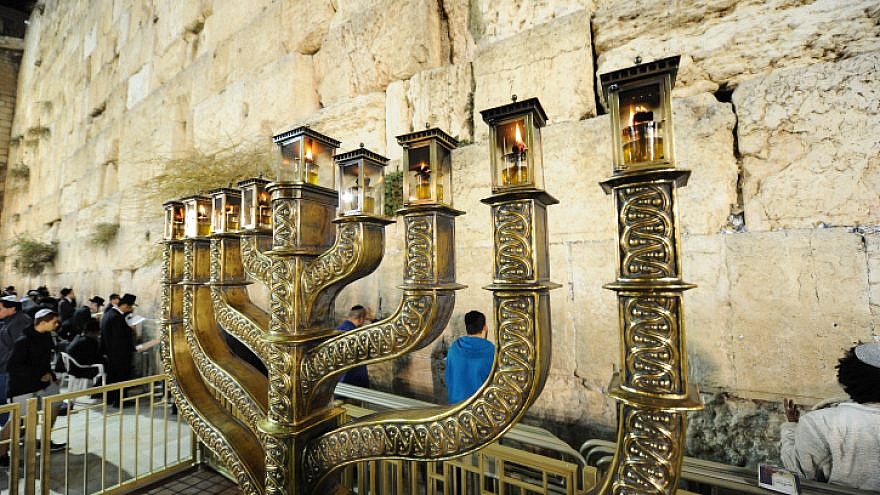 A Hanukkah menorah on the last night of the eight-day Jewish holiday, at the Western Wall in the Old City of Jerusalem, on Dec. 19, 2017. Photo by Mendy Hechtman/Flash90.