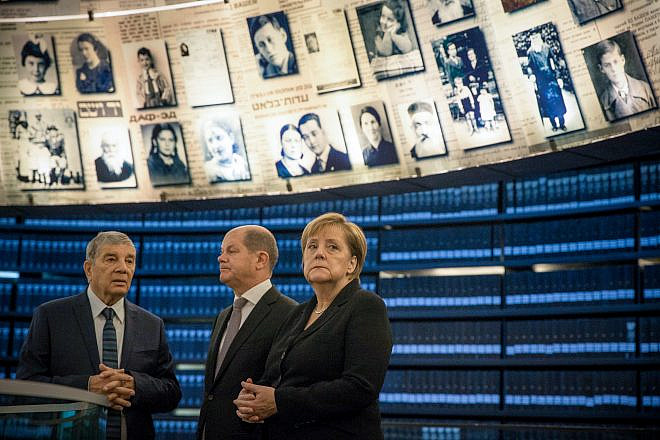 German Chancellor Angela Merkel at the Hall of Names during her visit at the Yad Vashem Holocaust memorial in Jerusalem on Oct. 4, 2018. Credit: Oren Ben Hakoon/POOL.