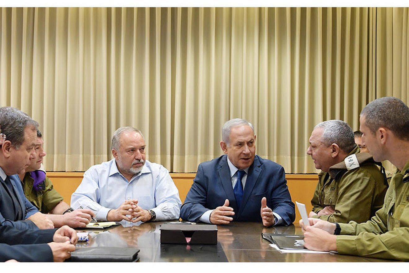 Israeli Prime Minister Benjamin Netanyahu holds a security consultation in Tel Aviv after the barrage of rocket fire from Hamas in Gaza.  Credit: GPO/Amos Ben-Gershom.