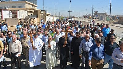 Iraqi Christians hold a procession in the Christian village of Qaraqosh in northern Iraq. Credit: Aid to the Church in Need.