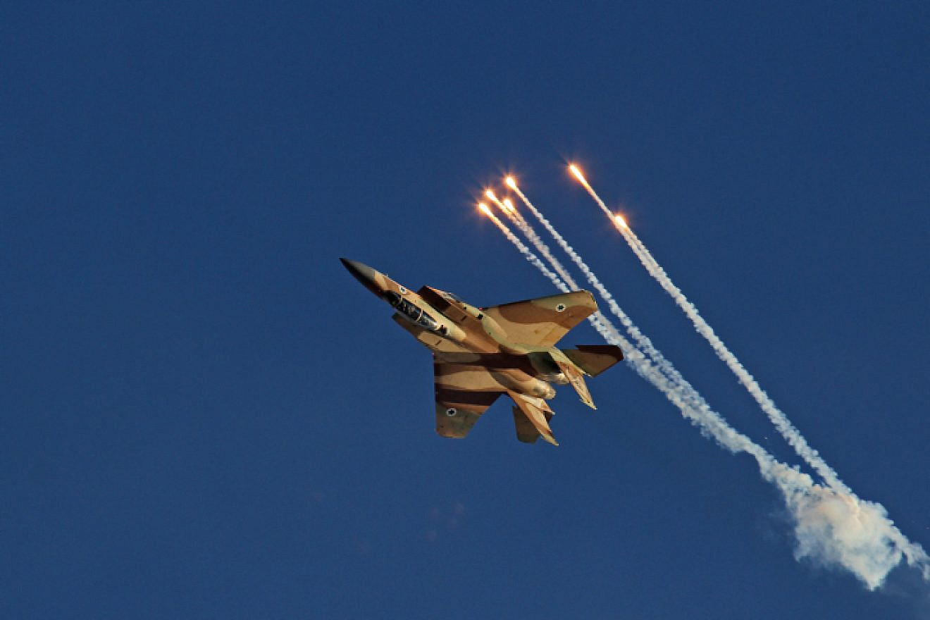 Aerobatic display of the F-15 fighter jet named as Ra'am, Hebrew for "Thunder," during the IAF (Israeli army Air Force) flight course 166 graduation ceremony in the Hatzerim Air Base in the Negev Desert on June 23, 2013. Photo by Ofer Zidon/Flash90.