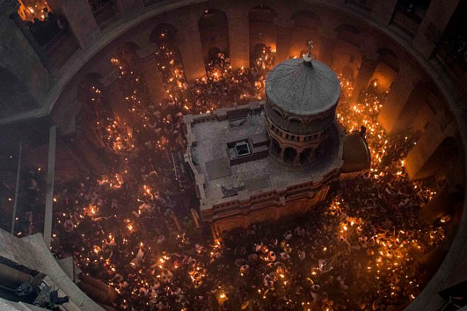 Thousands of Orthodox Christian worshippers take part in the Holy Fire ceremony at the Church of the Holy Sepulchre in Jerusalem’s Old City during the Easter holiday on April 7, 2018. Photo by Flash90.