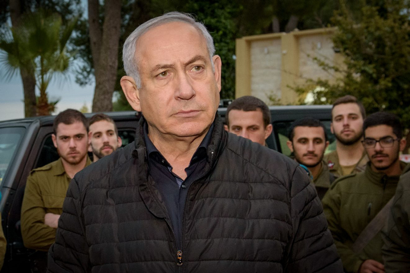 Israeli Prime Minister Benjamin Netanyahu speaks with Israeli soldiers during his visit at the Northern Command base in Tzfat on Dec. 11, 2018. Photo by Basel Awidat/Flash90.