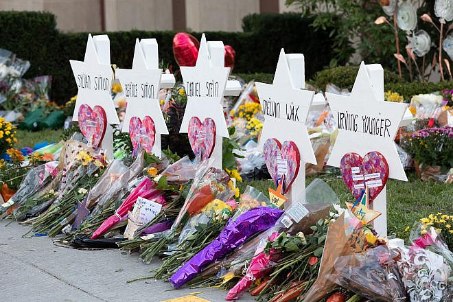 A memorial outside the Tree of Life*Or L’Simcha Synagogue in Pittsburgh following the mass shooting on Oct. 27, 2018, which left 11 worshippers dead. Credit: Wikimedia Commons.
