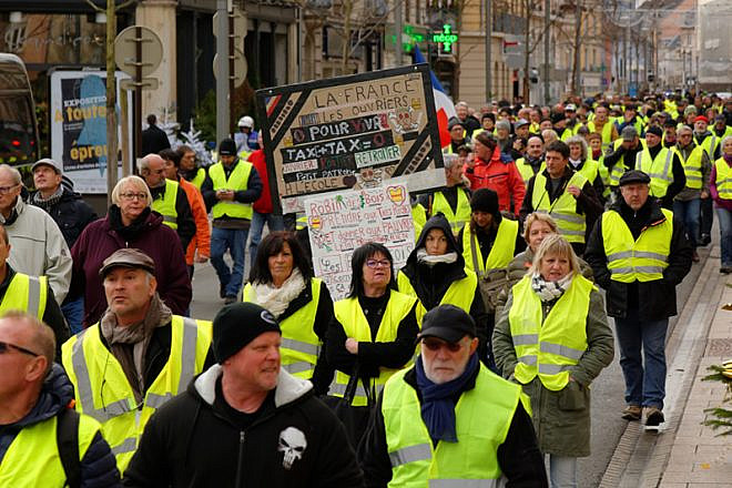 “Yellow-vests” movement protest in Belfort, France, on Dec. 1, 2018. Photo by Thomas Bresson via Wikimedia Commons.