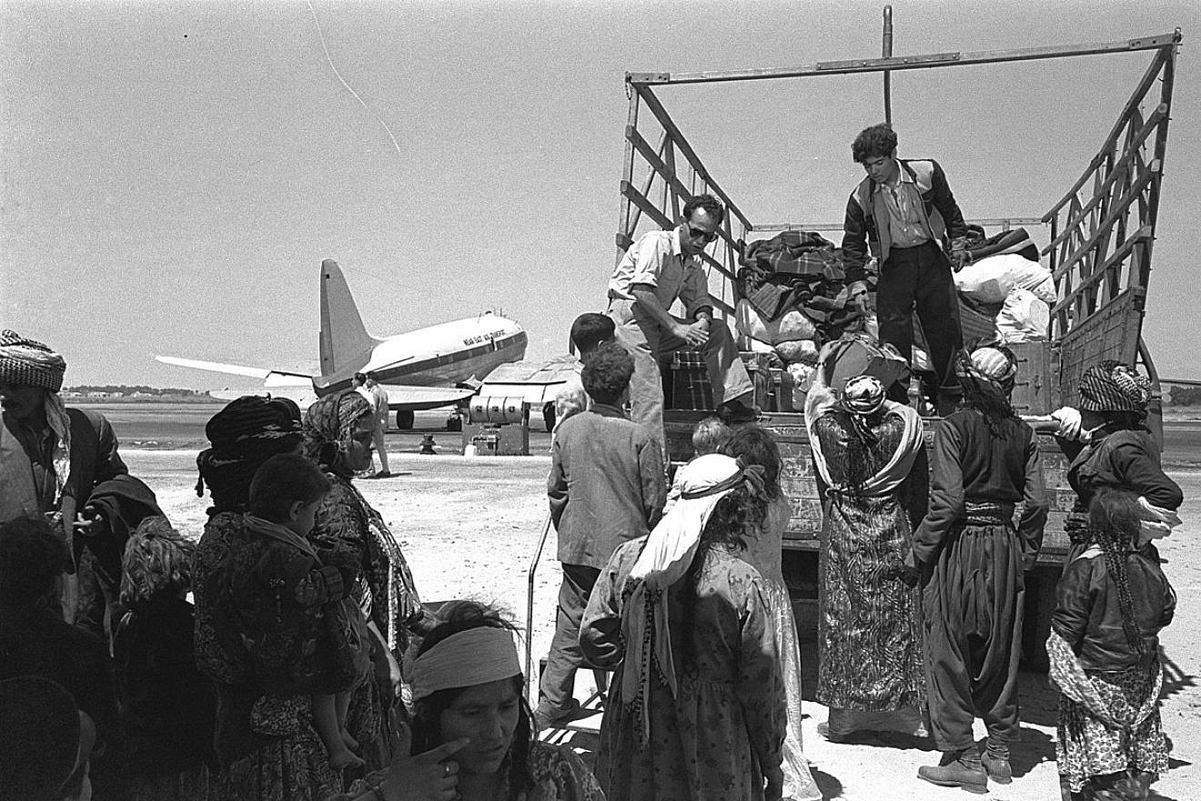 Iraqi Jews leaving Lod airport in Israel on their way to the Ma'abara transit camp, 1951. Source: Israel Government Press Office.