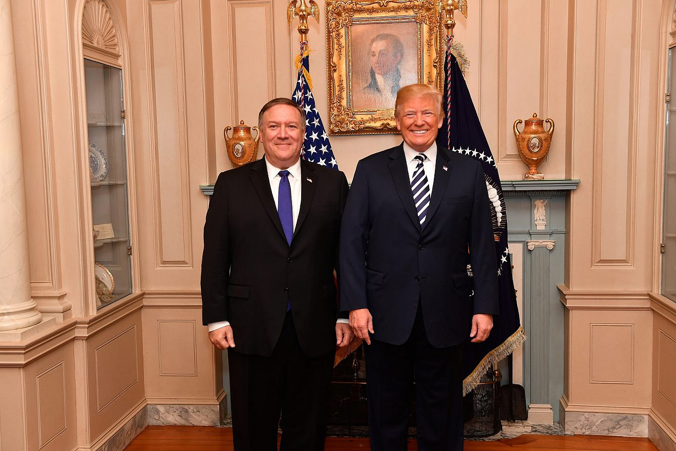 U.S. Secretary of State Mike Pompeo poses with U.S. President Donald Trump before his swearing-in ceremony at the U.S. Department of State in Washington, D.C., on May 2, 2018. Credit: State Department Photo/ Public Domain.