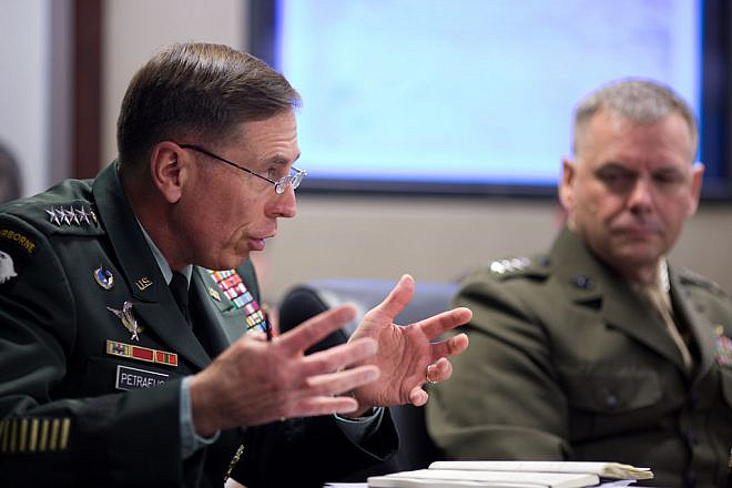 Retired General David Petraeus, left, gestures while talking with President Barack Obama and the national security team on Afghanistan and Pakistan, during a meeting in the Situation Room of the White House, May 6, 2010. Credit: Official White House Photo by Pete Souza.