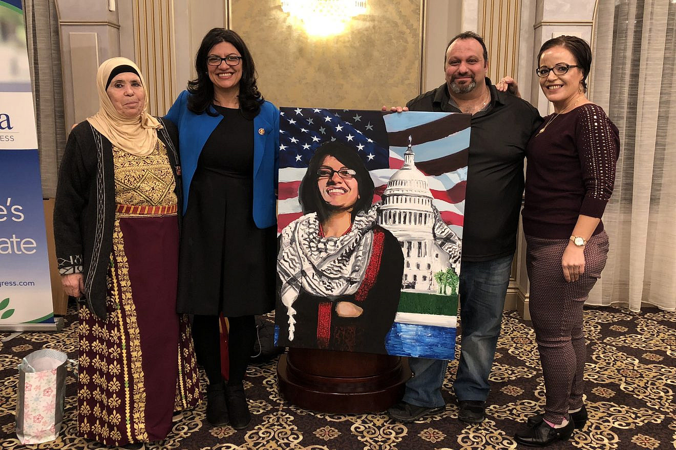 Executive director of the Palestine Right to Return Coalition Abbas Hamideh poses with Rep. Rashida Tlaib (D-Mich.) at a swearing-in ceremony and private dinner in Detroit on Jan. 12, 2019. Credit: Abbas Hamideh/Twitter.