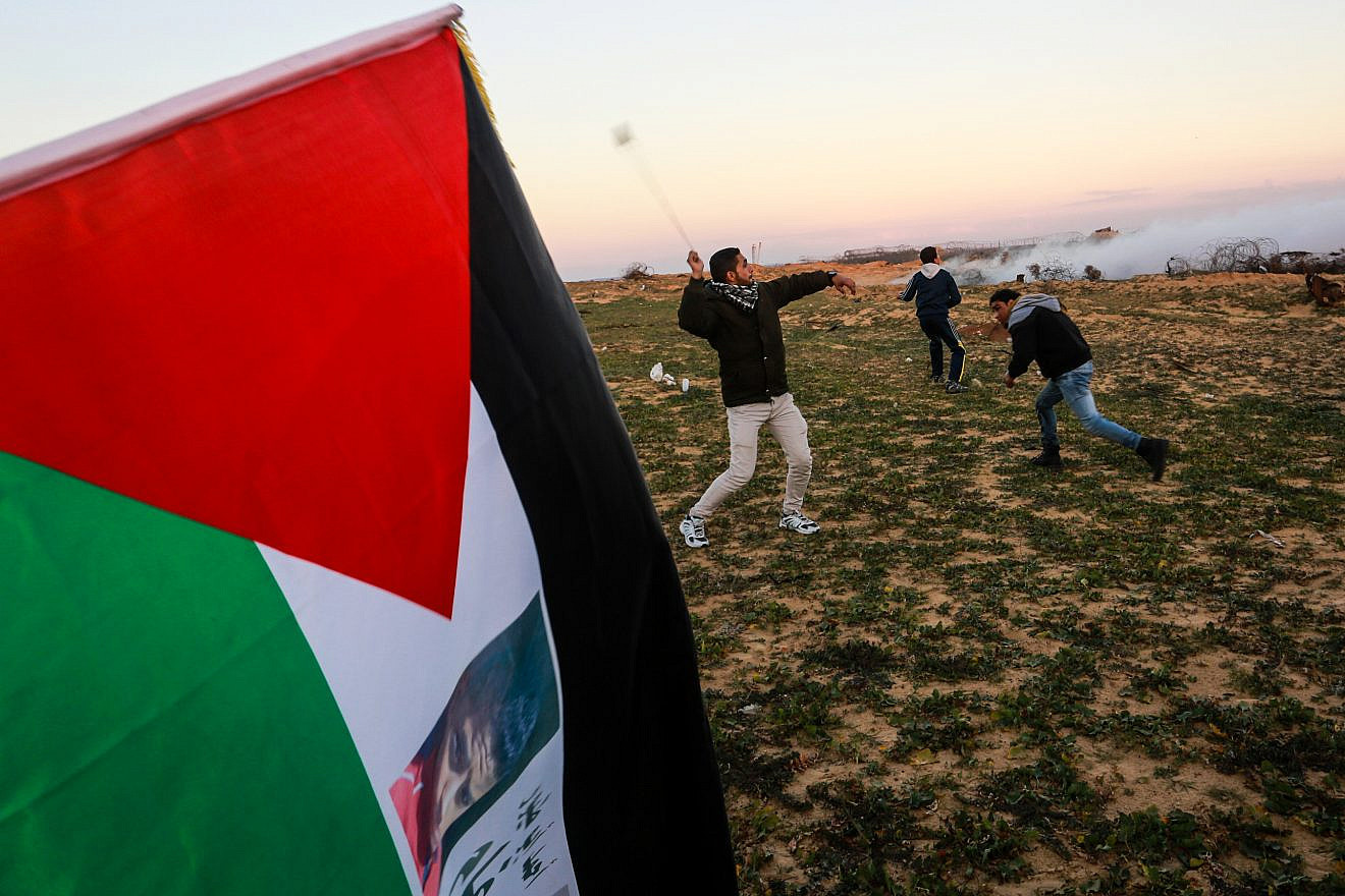 Palestinian protesters during clashes with the Israel Defense Forces following a demonstration along the border with Israel in the southern Gaza Strip, on Jan. 18, 2019. Photo by Abed Rahim Khatib/Flash90.