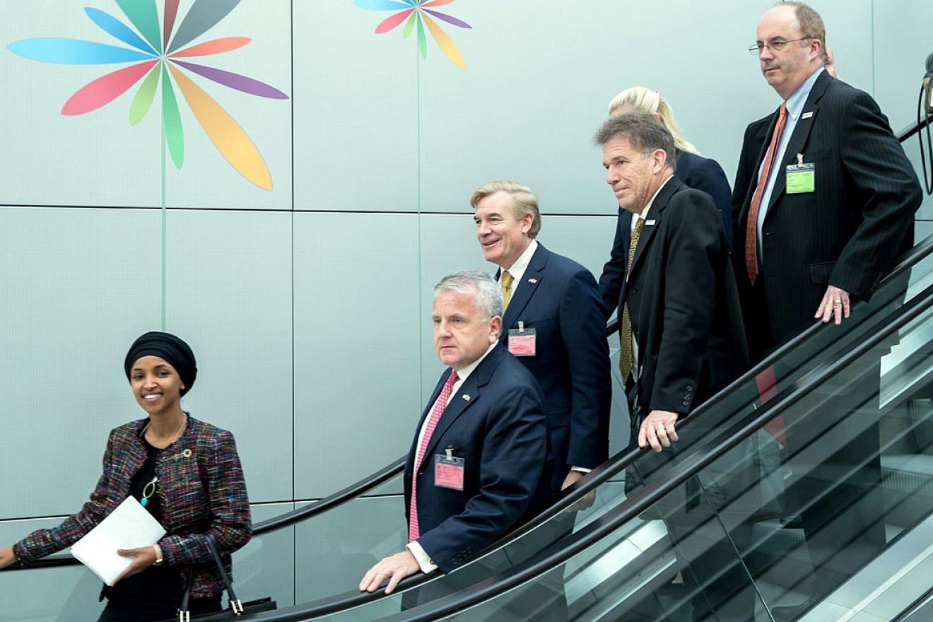 Deputy Secretary of State John Sullivan (bottom right) with (from left) Minnesotan State Representative Ilhan Omar, Chargé d’Affaires Brent Hardt from U.S. Embassy Paris, Minnesota World's Fair Bid Committee President Mark Ritchie, Expo Unit Director Jim Core arrives at the Bureau International des Expositions (BIE) General Assembly in Paris to present the Minnesota bid in Paris, France, on Nov. 15, 2017. Credit: U.S. Department of State from United States via Wikimedia Commons.