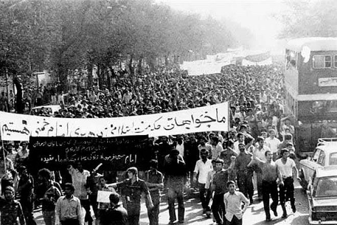 Demonstration in Iran on Sept. 8, 1978. The sentence on the placard read: “We want an Islamic government, led by Imam Khomeini.” Credit: Islamic Revolution Document Center via Wikimedia Commons.