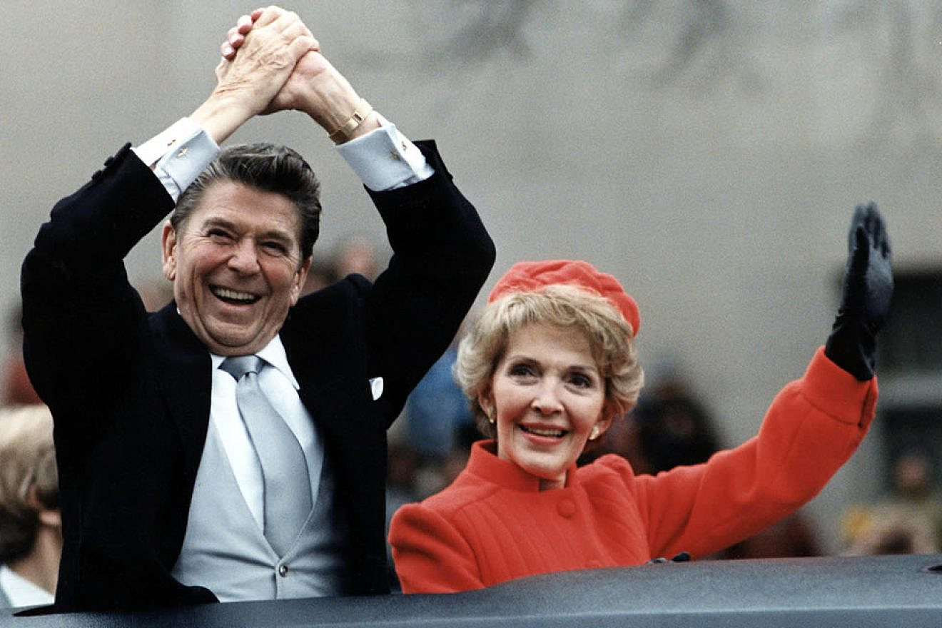 Ronald Reagan and his wife, Nancy, wave from the limousine during the Inaugural Parade in Washington, D.C., on Inauguration Day, Jan. 20, 1981. Credit: White House Photographic Office.
