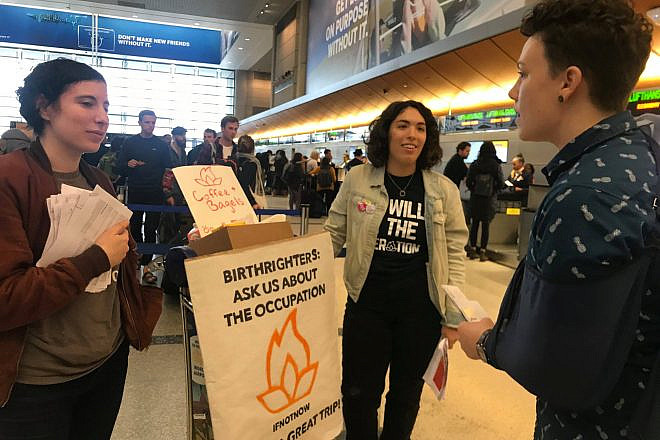 Members of the anti-Israel group IfNotNow encouraging Birthright participants to ask questions about the “occupation” at New York’s John F. Kennedy Airport. Source: IfNotNow/Facebook.