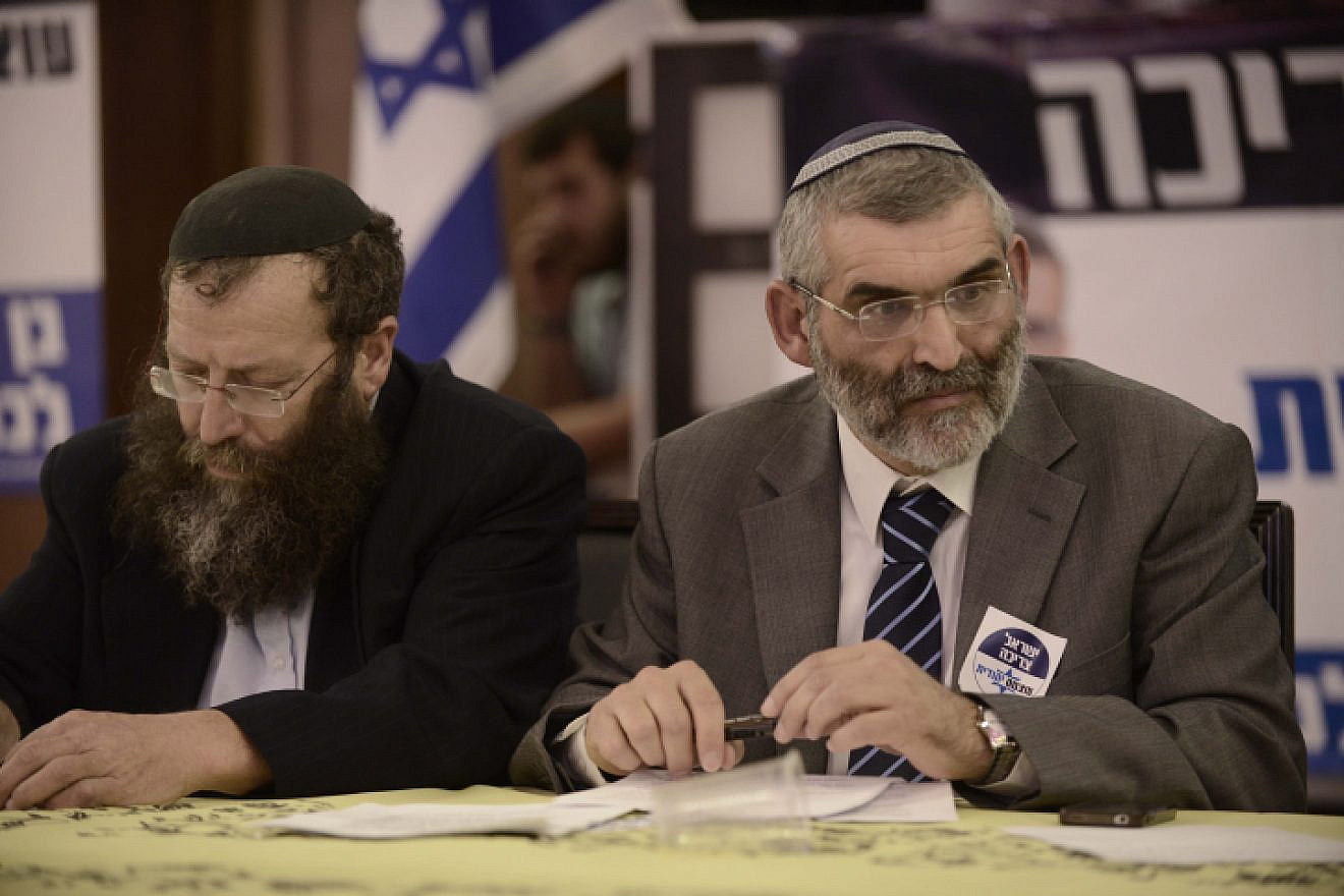 Former Israeli Knesset member and leader of the Otzma Yehudit Party Michael Ben-Ari (right) with  Baruch Marzel at the party's inaugural election conference in Petach Tikvah, on Dec. 24, 2014. Photo by Tomer Neuberg/Flash90.