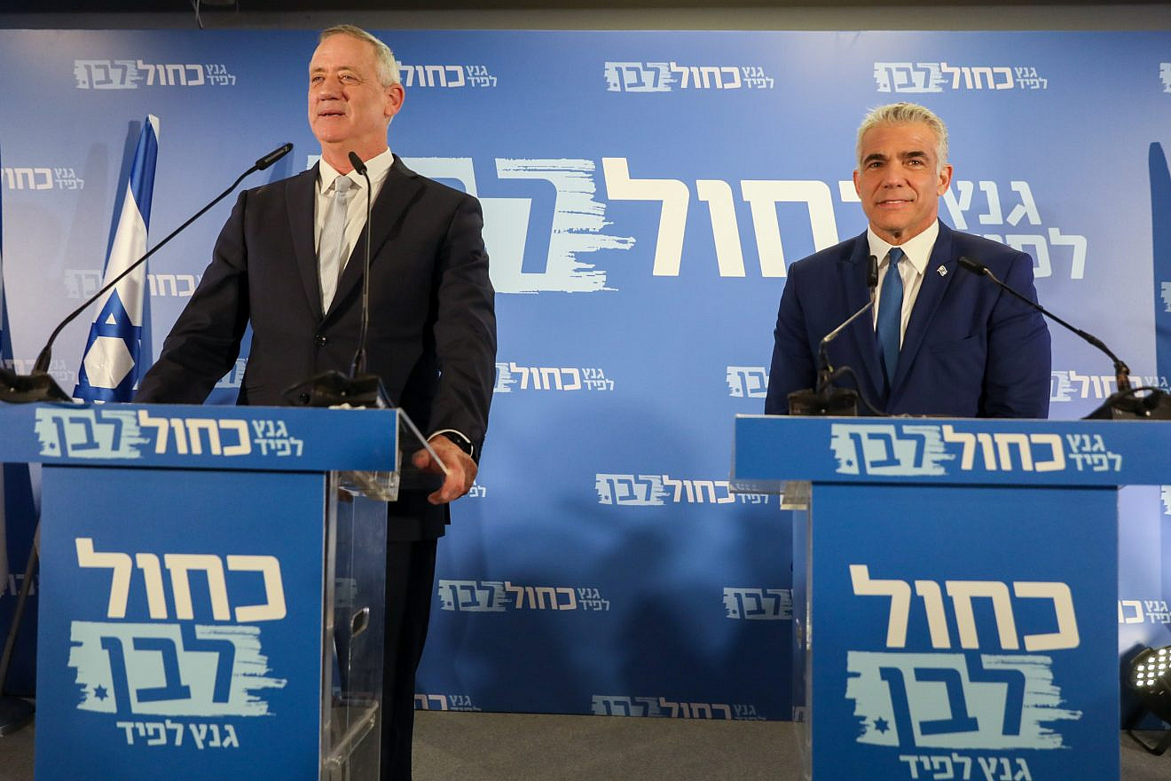 Benny Gantz and Yair Lapid of the Blue and White party give a joint a statement in Tel Aviv on Feb. 21, 2019. Credit: Noam Revkin Fenton/Flash90.