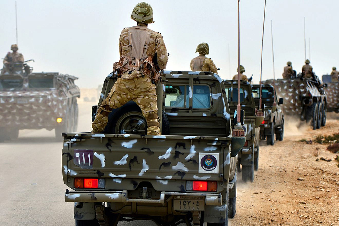 Qatar Armed Forces members convoy to a simulated terrorist cell to conduct a joint counter-terrorism exercise with U.S. military members and other partner nations in Zikrit, Qatar, on April 28, 2013. Credit: Staff Sgt. Kenneth Holston via Wikimedia Commons.