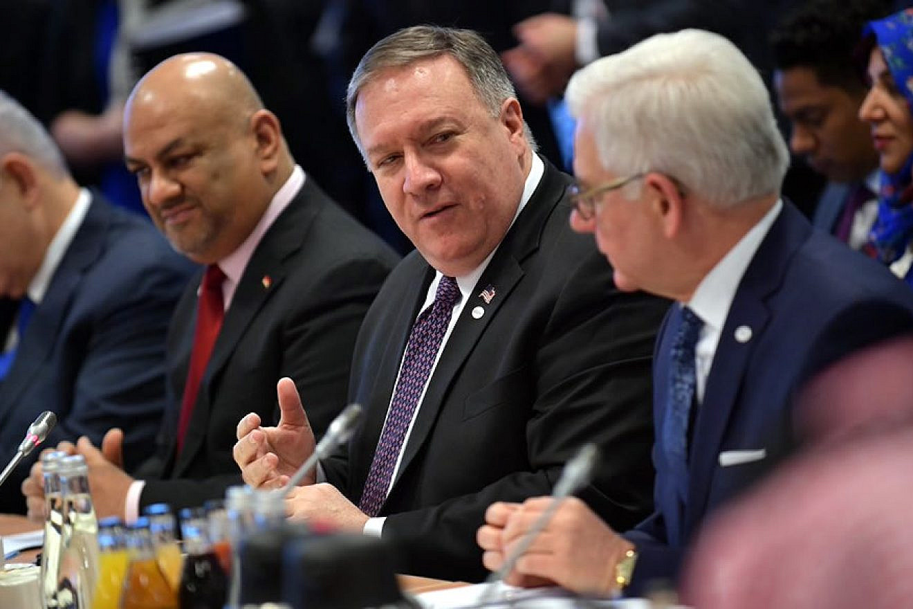 U.S. Secretary of State Mike Pompeo at Warsaw summit, called “The Ministerial Conference to Promote a Future of Peace and Security in the Middle East,” speaks with Polish Foreign Minister Jacek Czaputowicz. To his left is the Yemen’s Foreign Minister Khalid Al Yamani, and at far left is Israeli Prime Minister Benjamin Netanyahu. Credit: U.S. Secretary of State Mike Pompeo/Twitter.