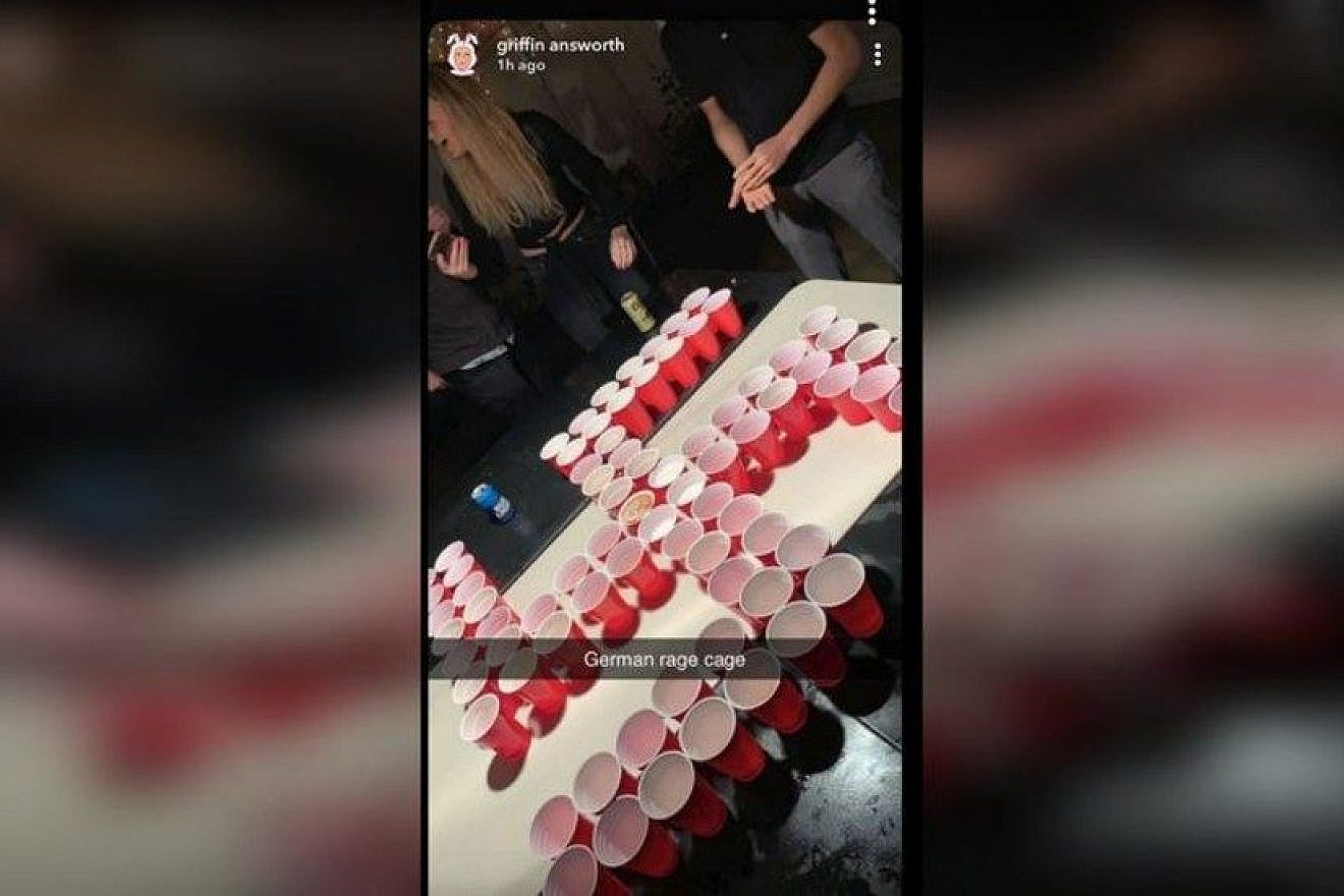 Red plastic cups arranged in the shape of a swastika at a party reportedly attended by Newport Beach students. Credit: Twitter screenshot.
