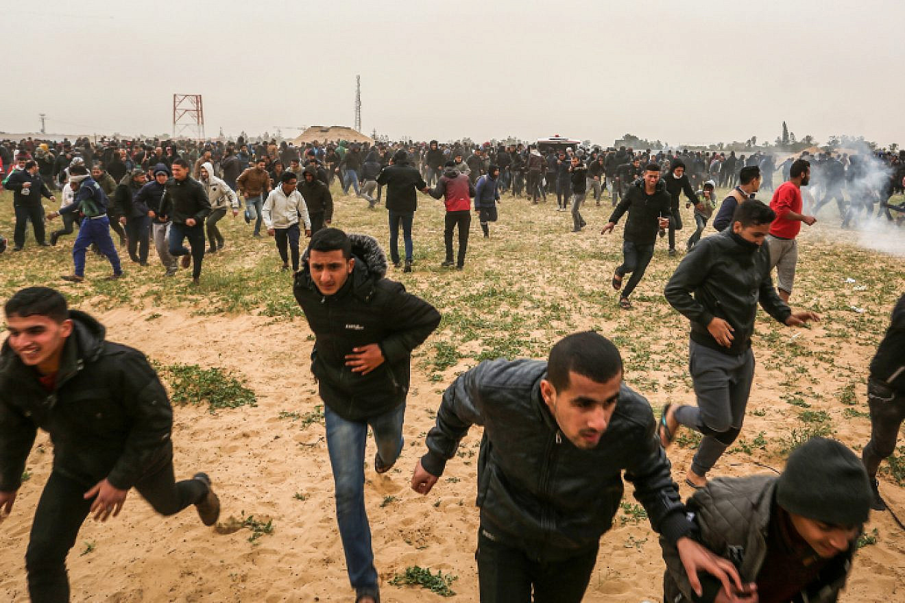 Palestinian protesters take part in a "Great March of Return" demonstration, near the Israel-Gaza border east of Rafah in the southern Gaza Strip, on March 30, 2019. Photo by Abed Rahim Khatib/Flash90.
