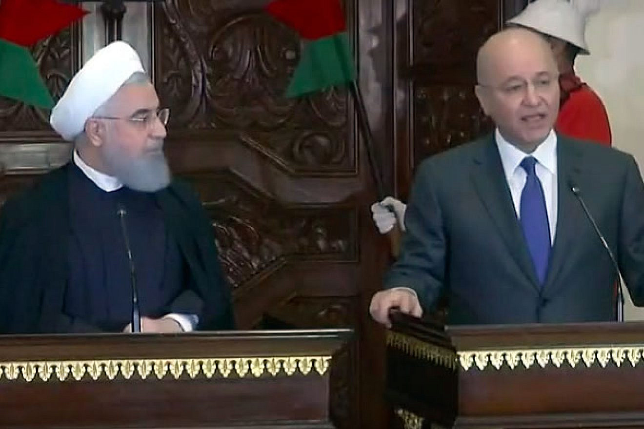 Iranian President Hassan Rouhani (left) and Iraqi President Barham Salih at a joint press conference in Baghdad on March 11, 2019. Credit: Screenshot.