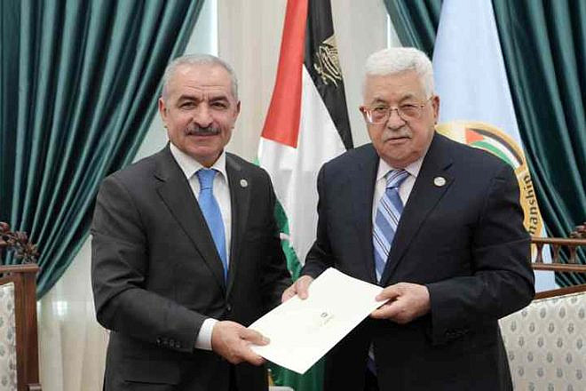 Mohammed Shtayyeh (left) accepts the position of prime minister of the Palestinian Authority from P.A. leader Mahmoud Abbas. Shtayyeh took office on April 14, 2019. Credit: JCPA.