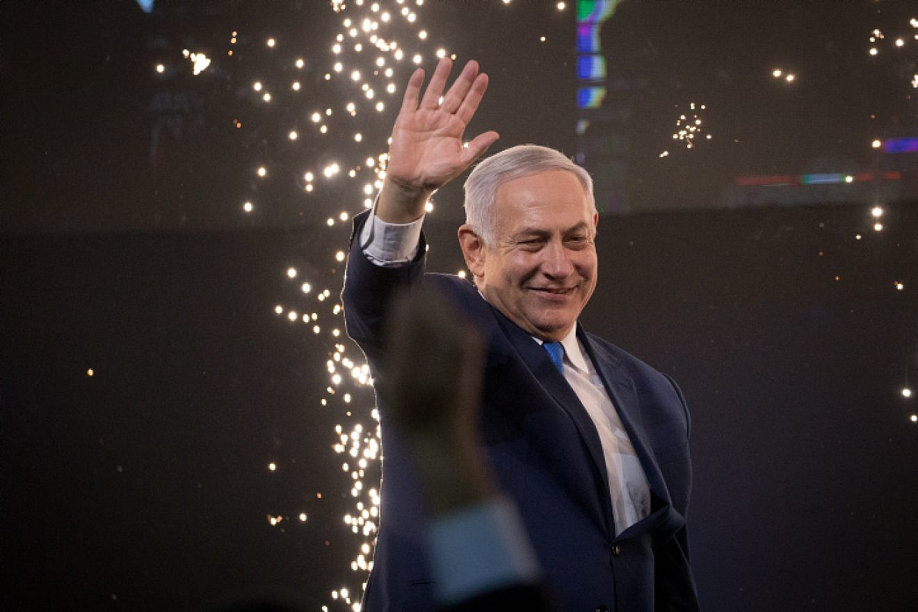 Israeli Prime Minister Benjamin Netanyahu waves to supporters at Likud Party headquarters in Tel Aviv on April 9, 2019. Photo by Yonatan Sindel/Flash90.