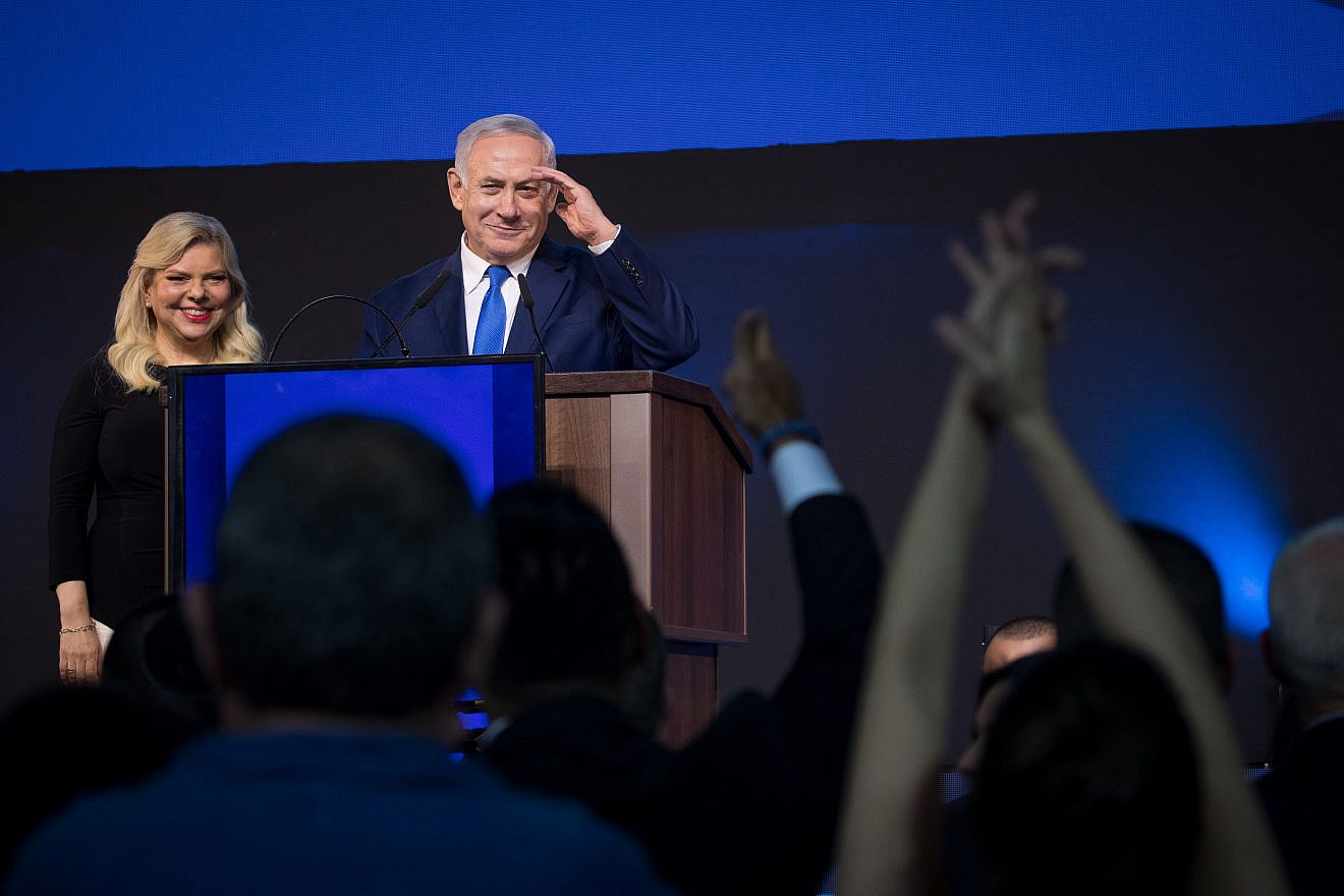 Israeli Prime Minister Benjamin Netanyahu and his wife, Sara, addresses supporters as the results in Israel's national elections are announced at party headquarters in Tel Aviv on April 9, 2019. Photo by Yonatan Sindel/Flash90.