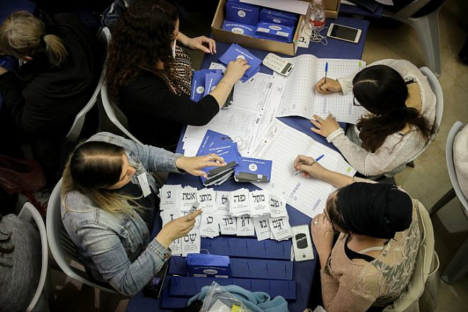 The ballots of soldiers and absentee voters are counted the day after national elections, on April 10, 2019. Photo by Noam Revkin Fenton/Flash90.