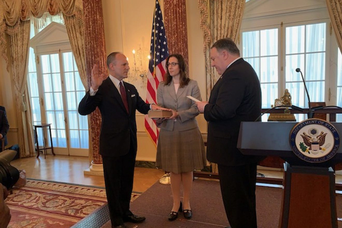 U.S. Special Envoy for Monitoring and Combating Anti-Semitism Elan Carr is sworn in (on a Hebrew Bible, or Tanach) by U.S. Secretary of State Mike Pompeo on April 11, 2019. Credit: Josh Katzen/JNS.