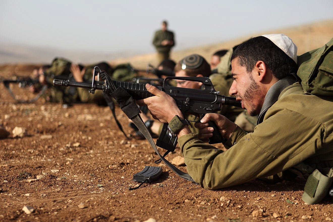 Israeli soldiers in the Nahal Haredi unit seen during a shooting exercise at the Peles Military Base in the northern Jordan Valley. Photo by Yaakov Naumi/Flash90.