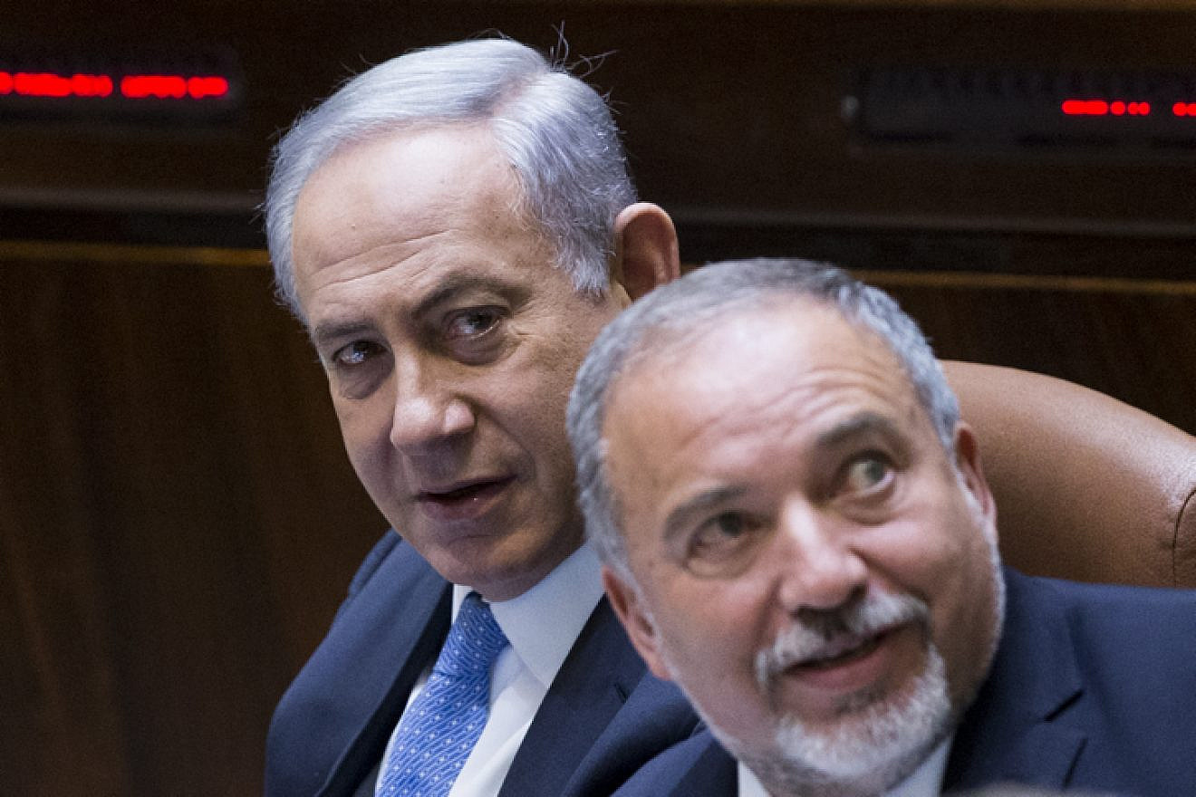 Israeli Prime Minister Benjamin Netanyahu and then-Defense Minister Avigdor Lieberman at the Knesset on June 1, 2016. Photo by Yonatan Sindel/Flash90.