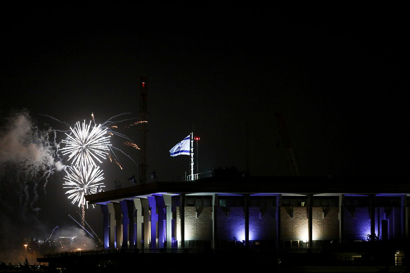 Fireworks from the Mount Herzl ceremony seen over the Knesset in Jerusalem, marking the beginning of celebrations for Israel's 71st Independence Day, May 8, 2019. Credit: Noam Revkin Fenton/Flash90.