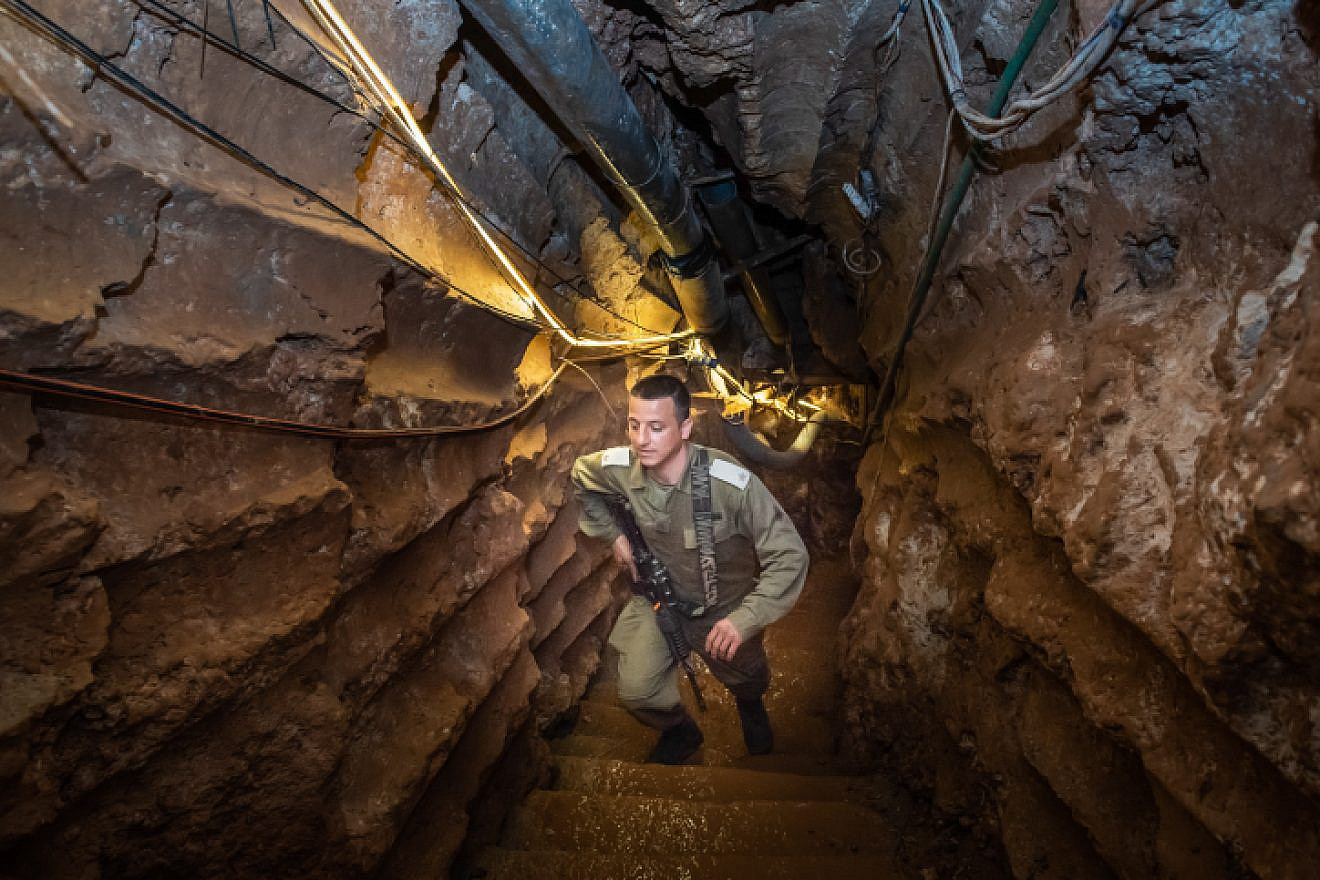 An Israeli soldier stands at a Hezbollah tunnel that crosses from Lebanon to Israel, on the border between Israel and Lebanon in northern Israel, on May 29, 2019. Photo by Basel Awidat/Flash90.